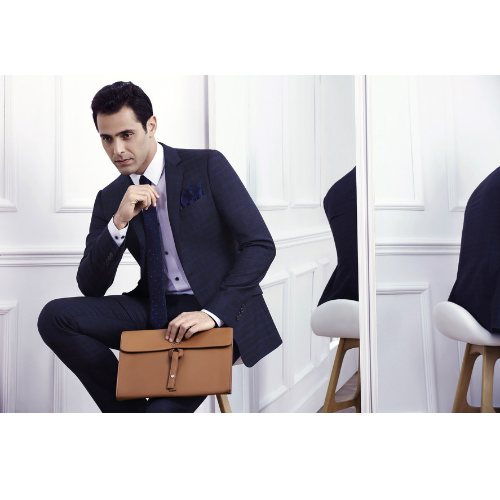 专业定制与一站式采购 艺美服饰集团引领工厂工作服与礼仪服务新风尚